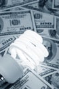 Compact Fluorescent Light bulb and dollar Royalty Free Stock Photo