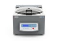 Modern laboratory centrifuge with digital display and clear lid Royalty Free Stock Photo