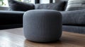 A compact, gray speaker designed for audio playback and smart home integration Royalty Free Stock Photo