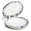 Compact mirror with LED lights makeup application Royalty Free Stock Photo