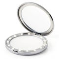 Compact mirror with LED lights makeup application Royalty Free Stock Photo