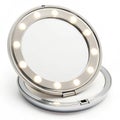 Compact mirror with LED lights makeup application Royalty Free Stock Photo