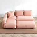 A compact modular sofa in a soft pastel shade with movable sections