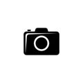 Compact Photo or Video Camera, DSLR. Flat Vector Icon illustration. Simple black symbol on white background. Compact Photo or Royalty Free Stock Photo