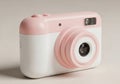 Compact pink and white digital camera Royalty Free Stock Photo