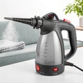 Handheld steam cleaner for upholstery Royalty Free Stock Photo