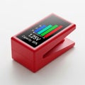 Red Digital Battery Tester with Display Showing Voltage and Capacity on White Surface power Royalty Free Stock Photo