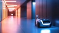 A compact robotic assistant navigates a futuristic corridor with glowing lights and sleek architecture in a high-tech environment Royalty Free Stock Photo