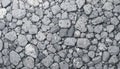 Compact stone background texture with small rough gray rock fragments and natural broken surface Royalty Free Stock Photo