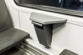Compact waste bin in the interior of a modern stadler electric train Royalty Free Stock Photo