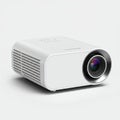 Compact white projector with a sleek rectangular design and rounded corners. Royalty Free Stock Photo