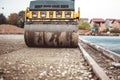Compactor on construction site. Road paving and compacting during highway construction Royalty Free Stock Photo