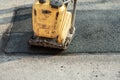 Compactor on new asphalt