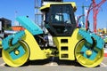 Compactor roller compacting asphalt