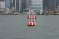 a companion buoy and boating channel marker in harbor hk