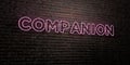 COMPANION -Realistic Neon Sign on Brick Wall background - 3D rendered royalty free stock image