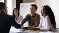 Company boss greeting client start negotiations shake hands express respect