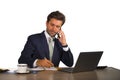 Company corporate isolated portrait of young handsome and attractive businessman working at office desk talking on mobile phone co Royalty Free Stock Photo