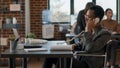 Company employee answering landline phone call in office Royalty Free Stock Photo