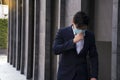 Company employees wearing masks and coughing caused by dust and coronavirus infection