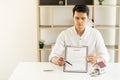 Company employees work with lease documents explaining the rental terms and conditions. Home and Real Estate Rental Ideas