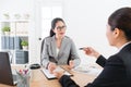 Company female colleagues talking together