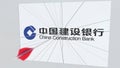 CHINA CONSTRUCTION BANK company logo being cracked by archery arrow. Corporate problems conceptual editorial 3D