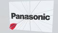 PANASONIC company logo being hit by archery arrow. Business crisis conceptual editorial 3D rendering