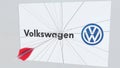 VOLKSWAGEN company logo being cracked by archery arrow. Corporate problems conceptual editorial 3D rendering