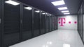 Logo of DEUTSCHE TELEKOM AG on the wall of a server room, editorial 3D rendering