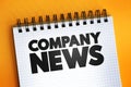 Company News text quote on notepad, concept background
