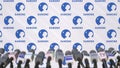 Media event of DANONE, press wall with logo and microphones, editorial 3D rendering