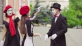 Funny mimes is crooking in the city