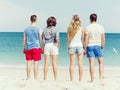 Company of young people on the beach