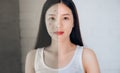 Comparison of Asian Woman Acne Face and After Clean Face