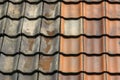 Comparison of old and new roof tiles in a side by side view for architectural contrast Royalty Free Stock Photo
