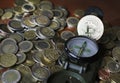 Compass and Bitcoin on a pile of Euro coins