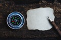 Compass, burnt brown paper and wooden pencil on crumples paper background, vintage tone, journey planning concept, blank space, Royalty Free Stock Photo