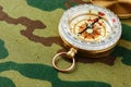 Compass on a camouflage