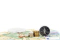 Compass and coins on money banknotes Euro and Dollars,concept of Royalty Free Stock Photo