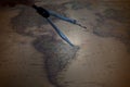 compass or dividers on old world map. Travel, Royalty Free Stock Photo
