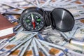 Compass on dollar bills. close up. Royalty Free Stock Photo