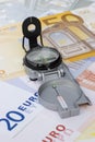 Compass on euro banknotes Royalty Free Stock Photo