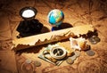 Compass, Globe and coins on the background old maps. Royalty Free Stock Photo