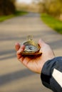 Compass in hand Royalty Free Stock Photo