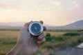 Compass in hand on a background of nature Royalty Free Stock Photo