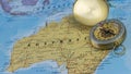 Compass on a close up map pointing at Australia and planning a travel destination. Royalty Free Stock Photo