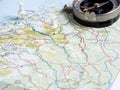 Compass and map with pushpins Royalty Free Stock Photo
