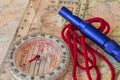 Compass on Map and Rescue Whistle Royalty Free Stock Photo