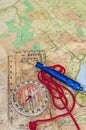 Compass on Map and Rescue Whistle Royalty Free Stock Photo